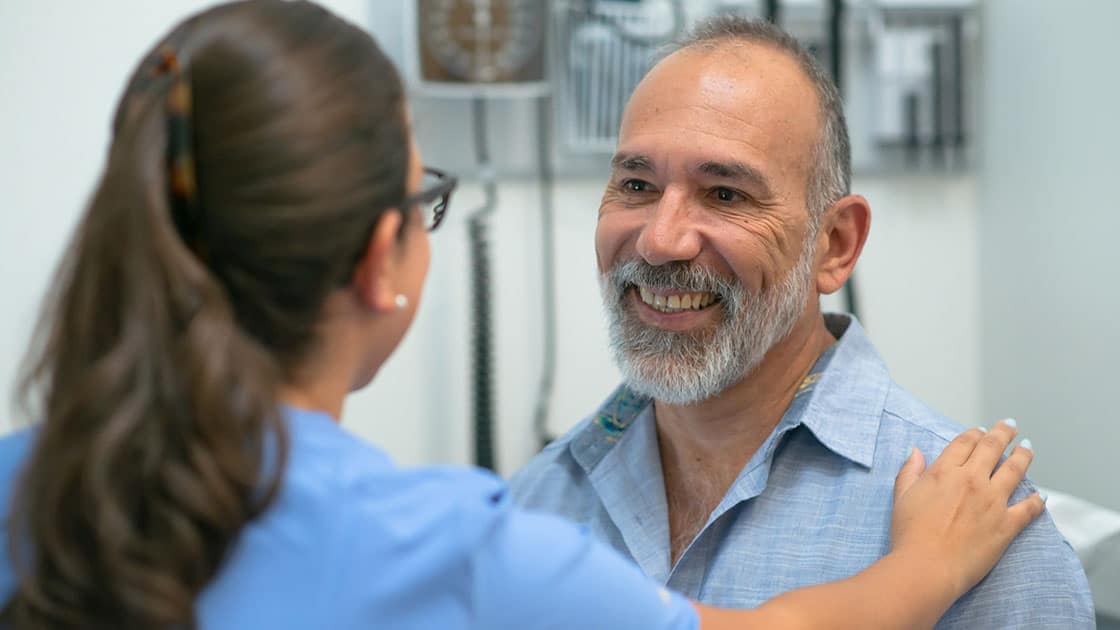 Health Aide With Man Photo